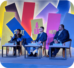 Advanced Tech Dynamics conference with speakers on stage